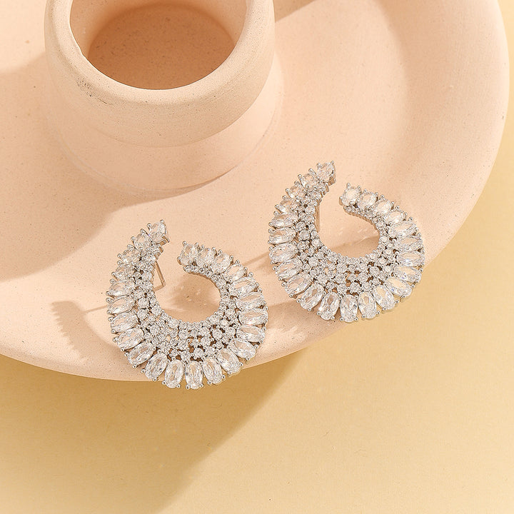 Luxurious Silver Serenade Crescent Earrings - Reet Pehal