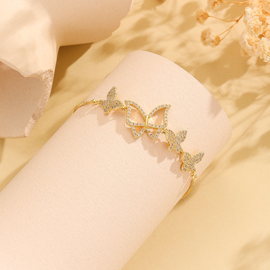 Glistening Golden Butterfly Charm Bracelet - Reet Pehal