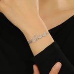 Load image into Gallery viewer, “Glistening Silver Butterfly Charm Bracelet - Reet Pehal
