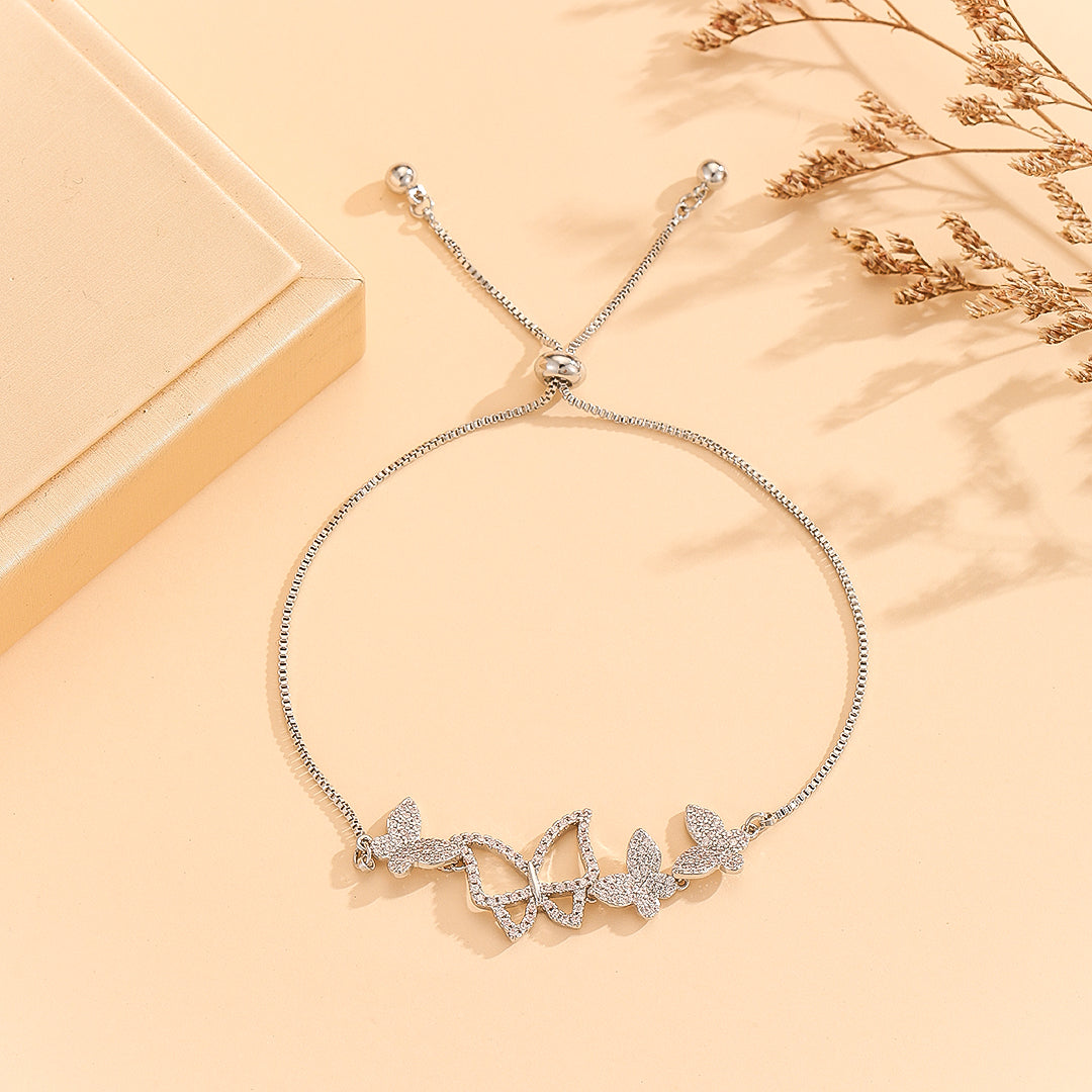 “Glistening Silver Butterfly Charm Bracelet - Reet Pehal