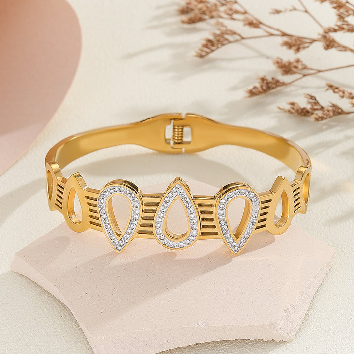 Luminous Gold Pear-Shaped Bangle - Reet Pehal