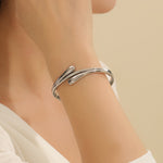 Load image into Gallery viewer, Luxe Wave Crossover Bangle
