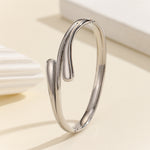 Load image into Gallery viewer, Luxe Wave Crossover Bangle
