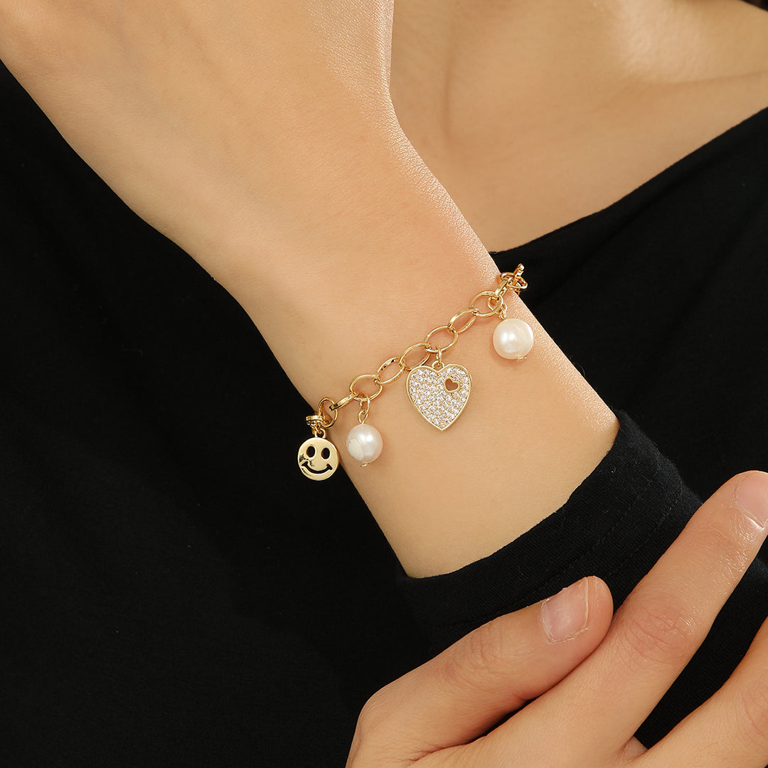 Breathtaking Golden Joy Charm Bracelet - Reet Pehal