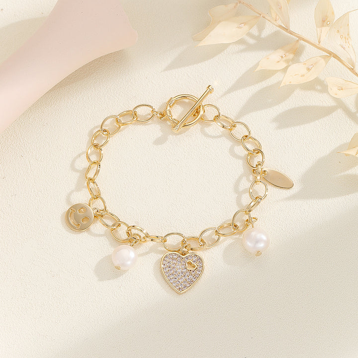 Breathtaking Golden Joy Charm Bracelet - Reet Pehal