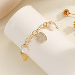 Load image into Gallery viewer, Breathtaking Golden Joy Charm Bracelet - Reet Pehal
