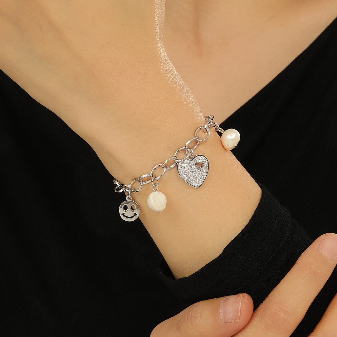 Breathtaking Silver Joy Charm Bracelet - Reet Pehal