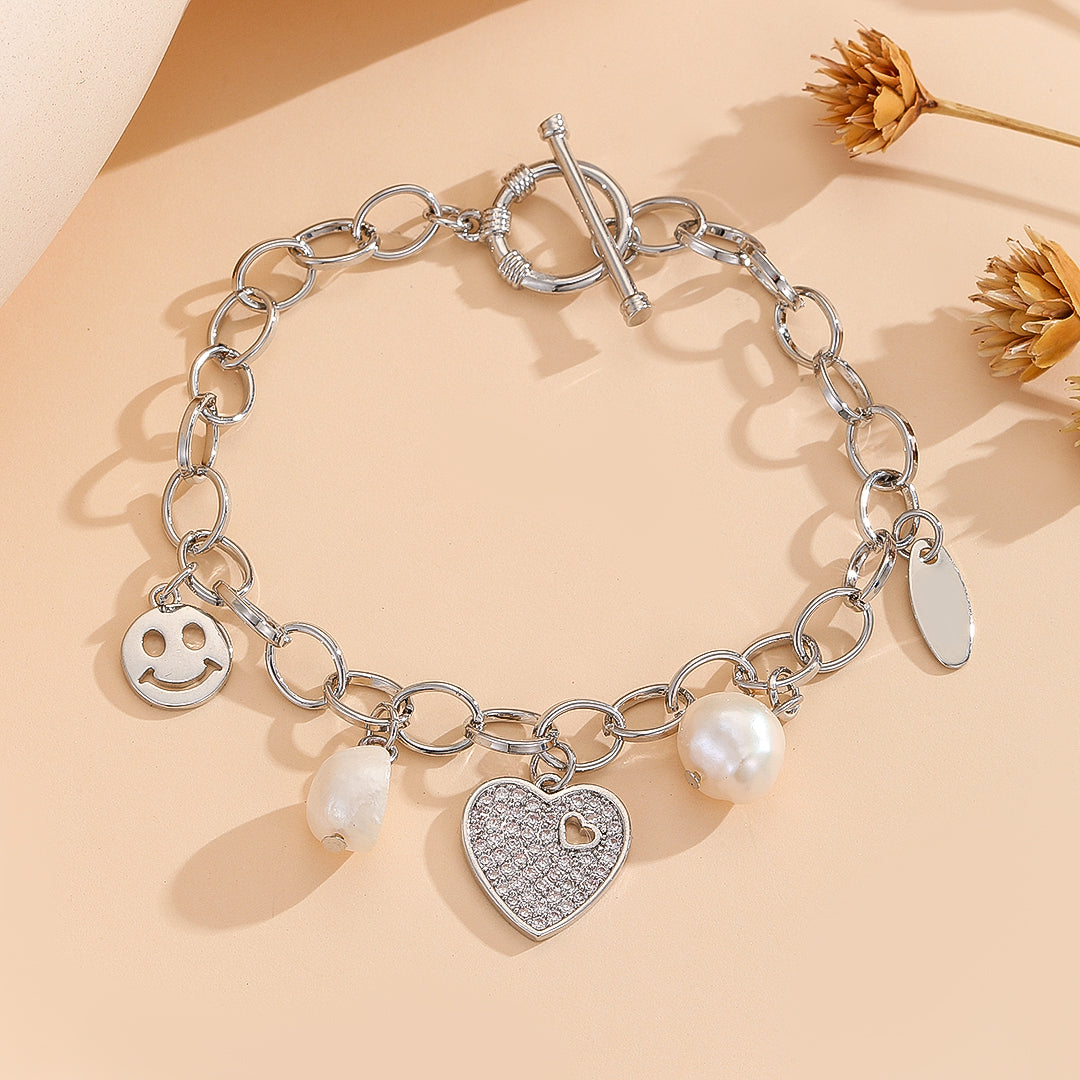 Breathtaking Silver Joy Charm Bracelet - Reet Pehal