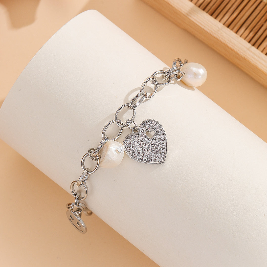 Breathtaking Silver Joy Charm Bracelet - Reet Pehal