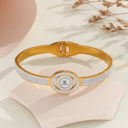 Beautiful Gold Chanel Logo Bangle Bracelet - Reet Pehal