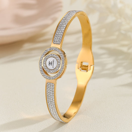 Beautiful Gold Chanel Logo Bangle Bracelet - Reet Pehal