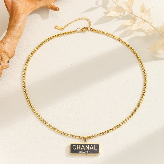 Stunning Chanel Logo Gold Necklace - Reet Pehal