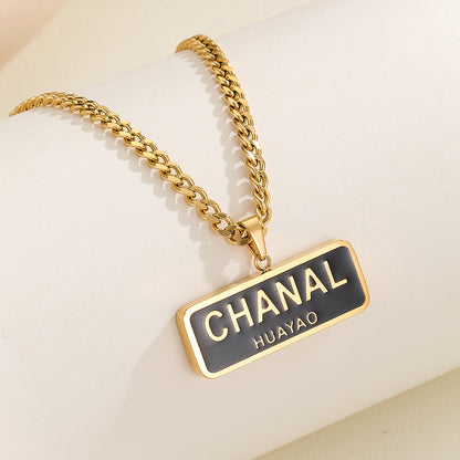 Stunning Chanel Logo Gold Necklace - Reet Pehal