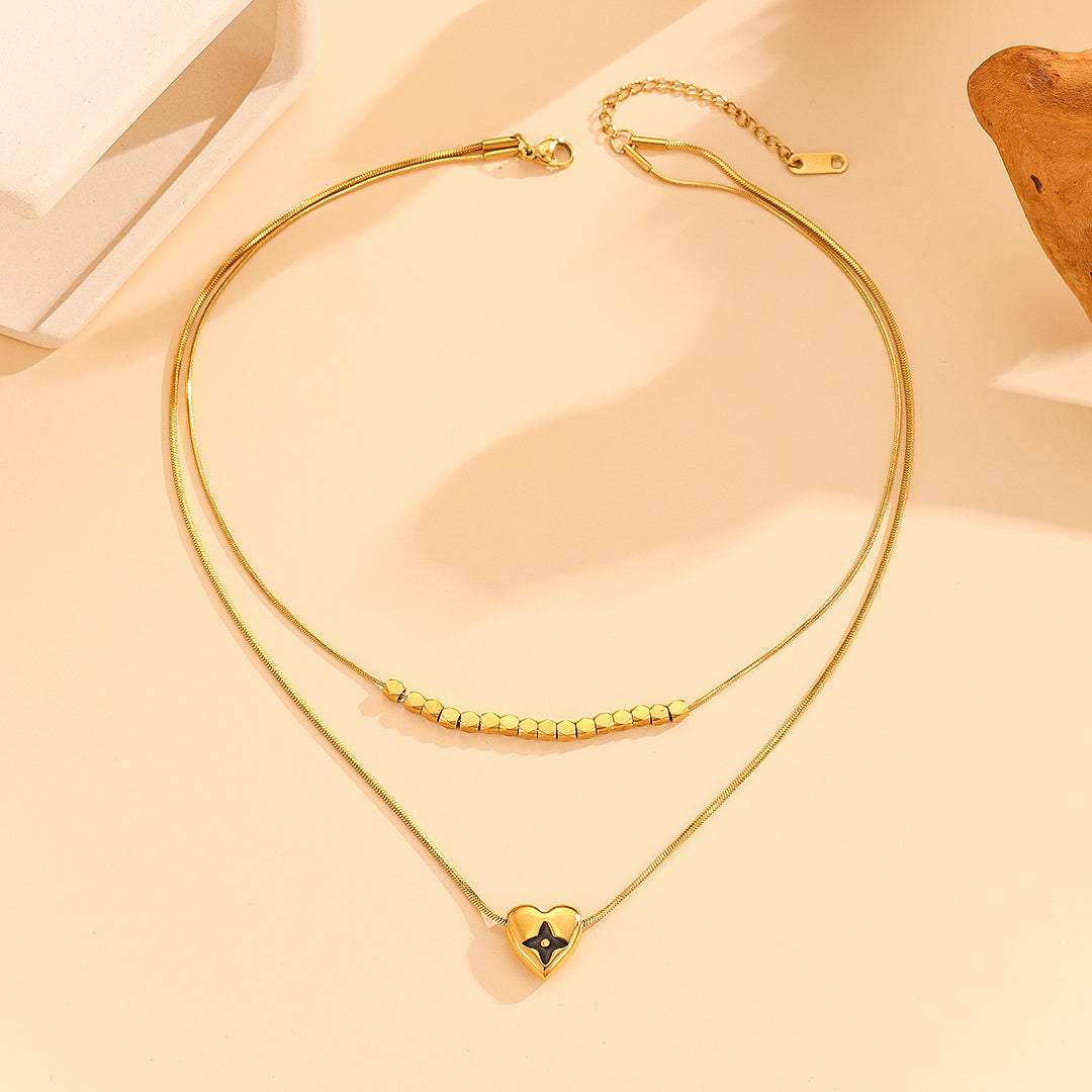 Sleek Heart & Star Gold Pendant - Reet Pehal