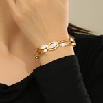 Load image into Gallery viewer, Gilded Oval Splendor Bangle - Reet Pehal
