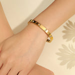 Load image into Gallery viewer, Silken Symphony Gold Bangle - Reet Pehal
