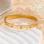 Load image into Gallery viewer, Silken Symphony Gold Bangle - Reet Pehal
