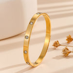 Load image into Gallery viewer, Silken Symphony Gold Bangle - Reet Pehal
