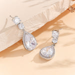 Load image into Gallery viewer, Halo Elegance Diamond Drop Earrings - Reet Pehal
