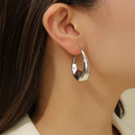 Load image into Gallery viewer, Minimalist Silver Oval Hoops - Reet Pehal
