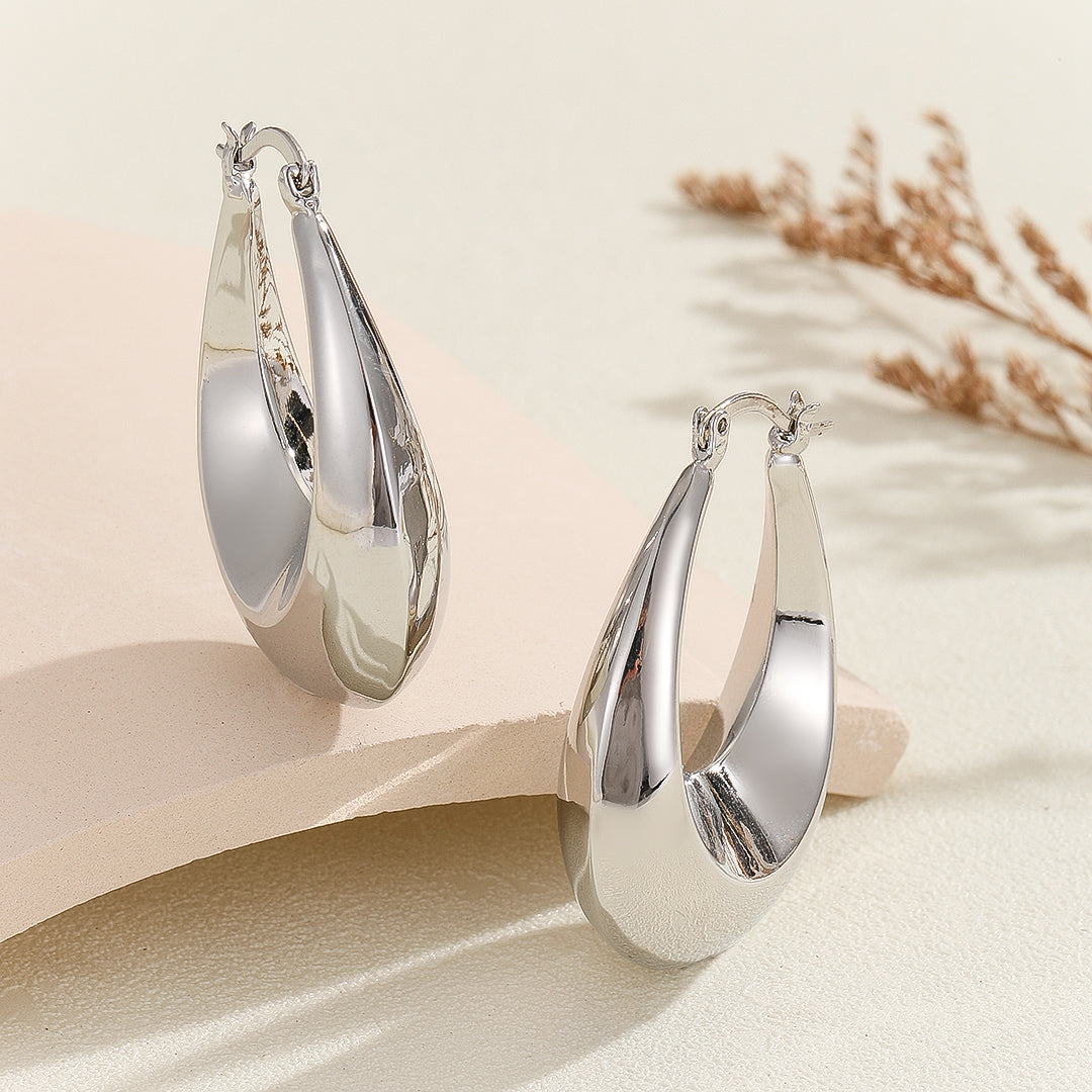 Minimalist Silver Oval Hoops - Reet Pehal