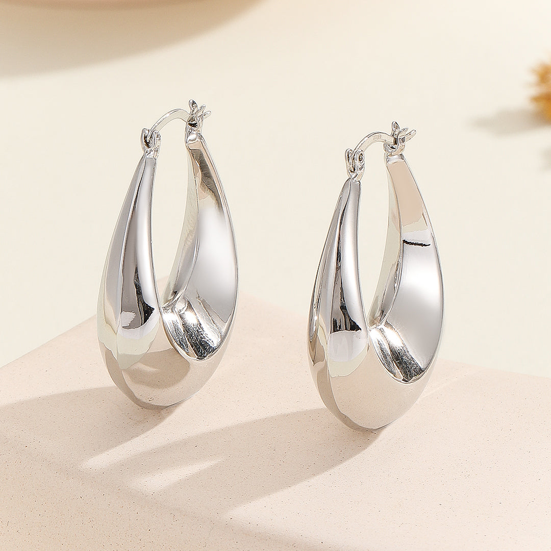 Minimalist Silver Oval Hoops - Reet Pehal