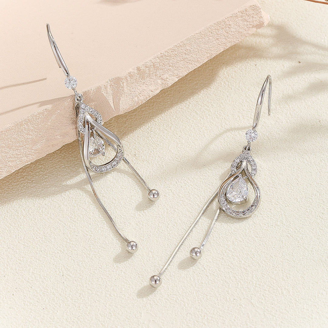 Enticing Silver Tear-Drop Dangle Earrings - Reet Pehal