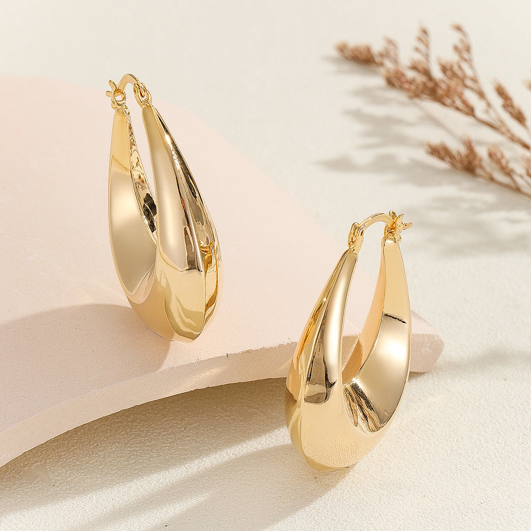 Minimalist Gold Oval Hoops - Reet Pehal