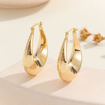 Load image into Gallery viewer, Minimalist Gold Oval Hoops - Reet Pehal
