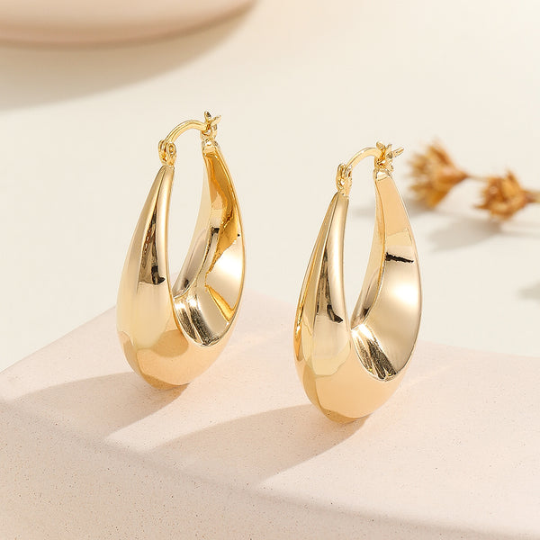 Minimalist Gold Oval Hoops - Reet Pehal