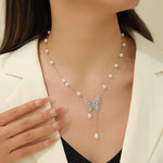 Load image into Gallery viewer, Pearl-Dusted Butterfly Necklace - Reet Pehal
