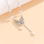 Load image into Gallery viewer, Pearl-Dusted Butterfly Necklace - Reet Pehal
