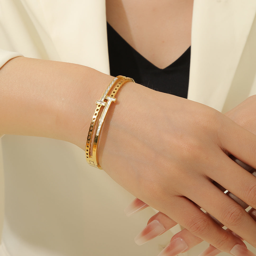 Contemporary Twist Gold Bangle - Reet Pehal