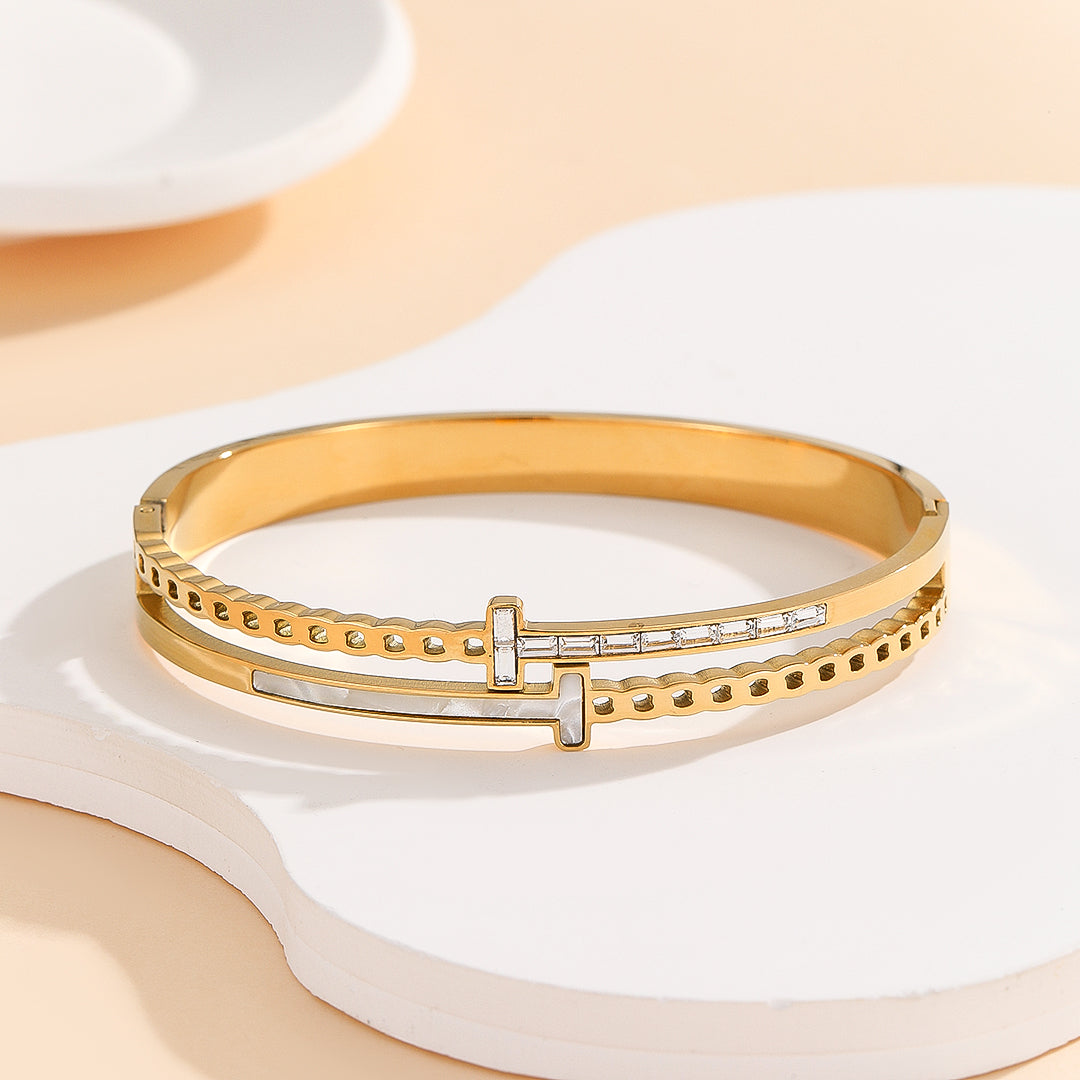 Contemporary Twist Gold Bangle - Reet Pehal