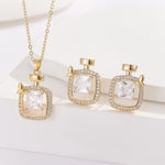 Load image into Gallery viewer, Hypnotizing Gold Perfume Bottle Pendant Set - Reet Pehal
