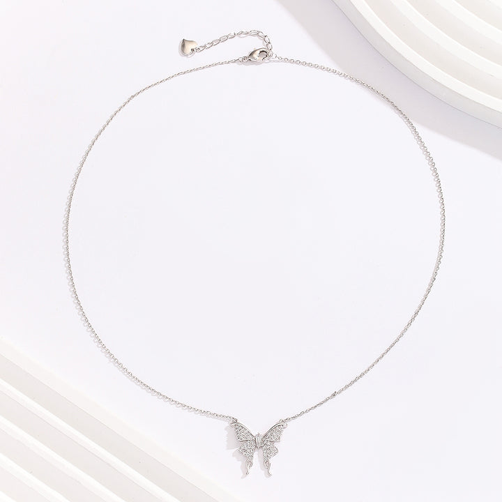 Shimmering Butterfly Charm Pendant - Reet Pehal