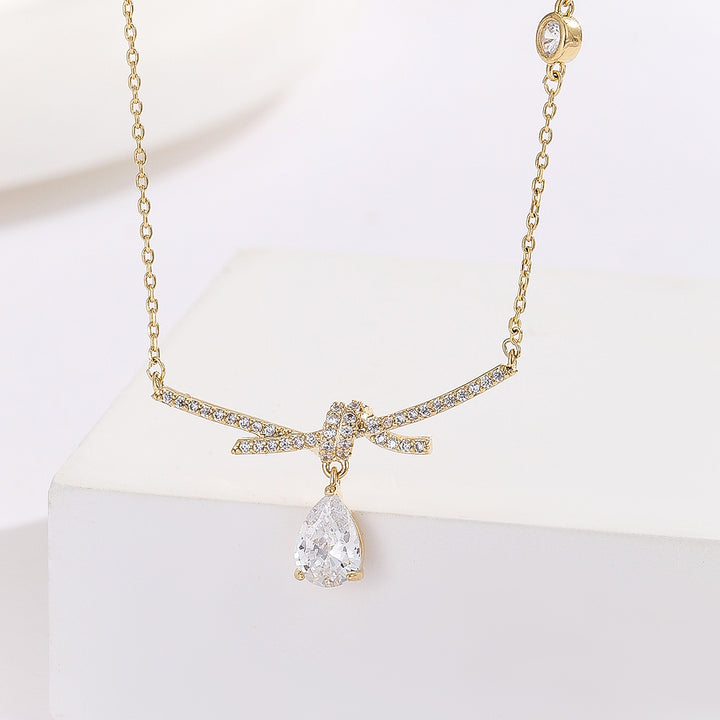 Lustrous Knot Delight Gold Pendant - Reet Pehal