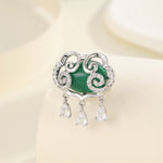 Load image into Gallery viewer, Swirling Emerald Radiance Brooch - Reet Pehal
