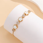 Load image into Gallery viewer, Elegant Gold Clover Bloom Bracelet - Reet Pehal
