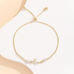 Load image into Gallery viewer, Stylish Stone-Studded Gold Love Bracelet - Reet Pehal
