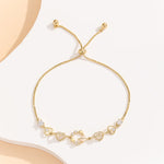 Load image into Gallery viewer, Graceful Gold Hearts Aglow Starry Bracelet - Reet Pehal
