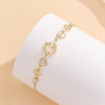 Load image into Gallery viewer, Graceful Gold Hearts Aglow Starry Bracelet - Reet Pehal
