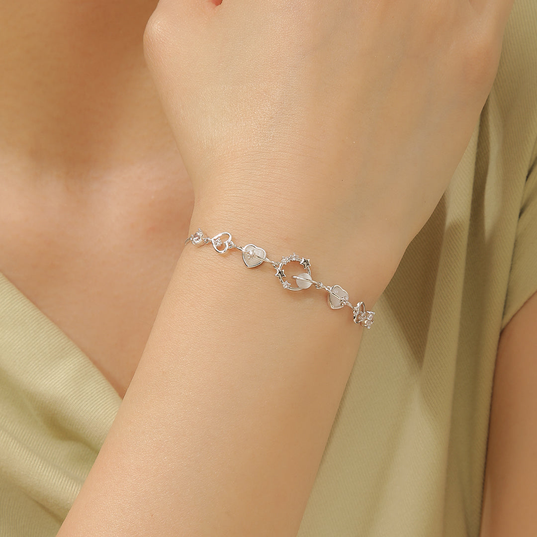 Graceful Silver Hearts Aglow Starry Bracelet - Reet Pehal