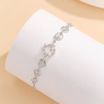 Load image into Gallery viewer, Graceful Silver Hearts Aglow Starry Bracelet - Reet Pehal
