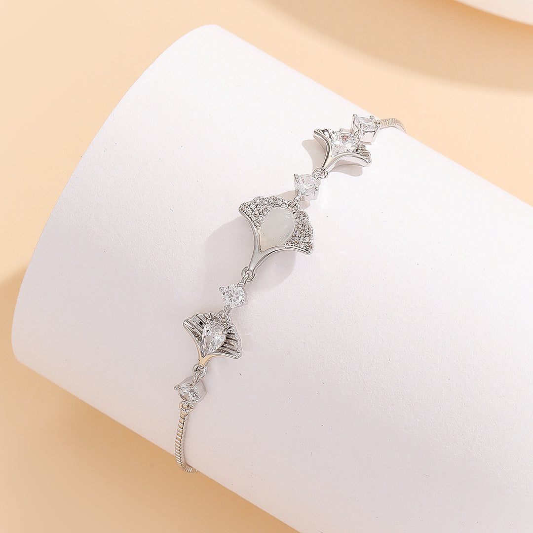 Lovely Silver Seashell Serenade Bracelet - Reet Pehal