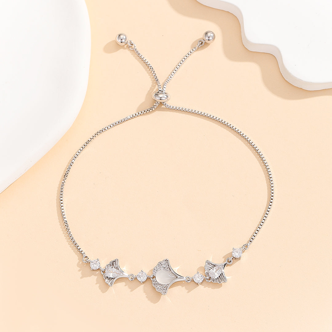 Lovely Silver Seashell Serenade Bracelet - Reet Pehal