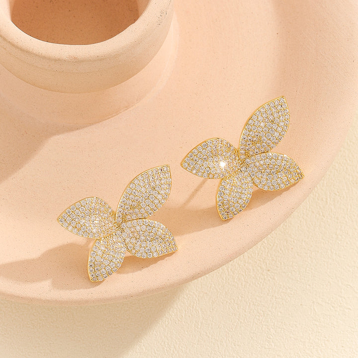 Opulent Golden Fluttering Butterfly Earrings - Reet Pehal