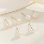 Load image into Gallery viewer, Fine-looking Pearl Gold Studs - Reet Pehal
