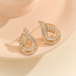 Load image into Gallery viewer, Pretty Golden Paisley Shaped Earring - Reet Pehal
