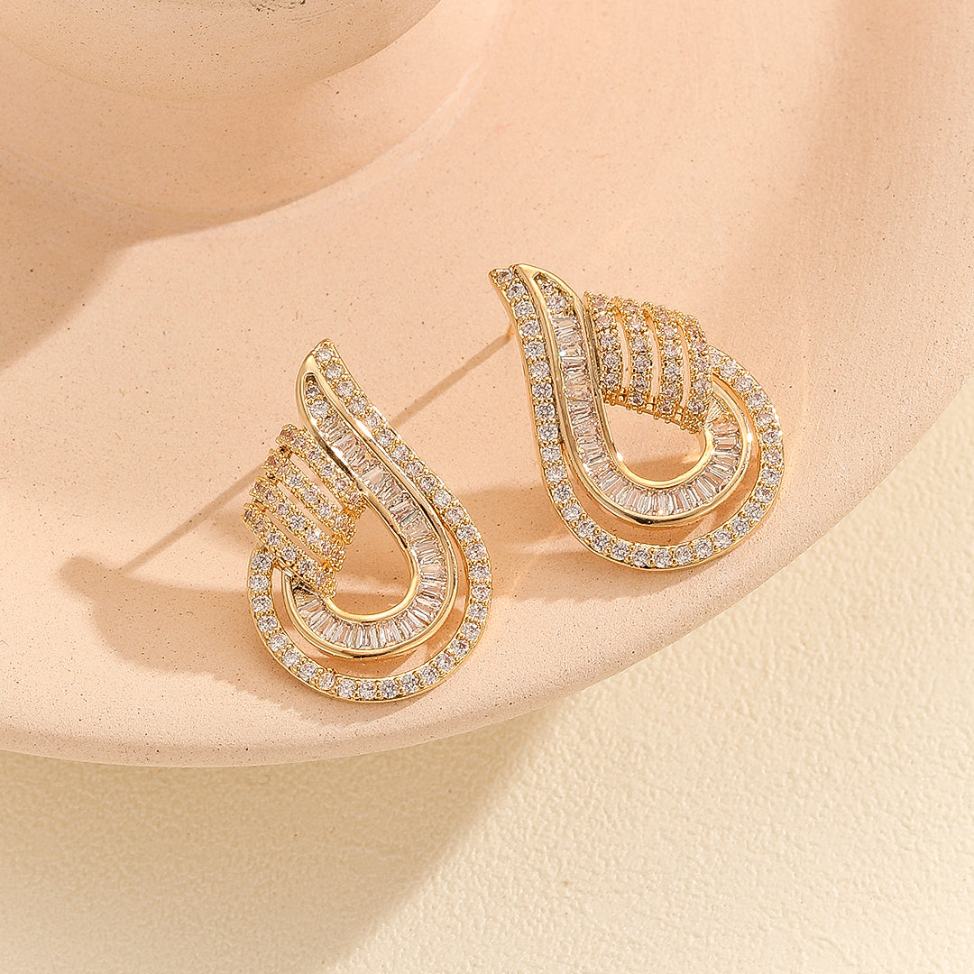 Pretty Golden Paisley Shaped Earring - Reet Pehal